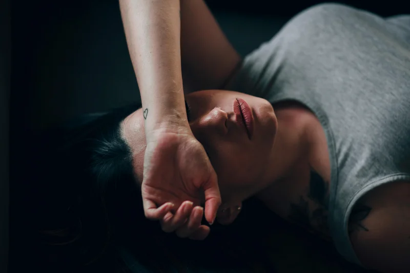Woman managing fatigue and autoimmune health challenges