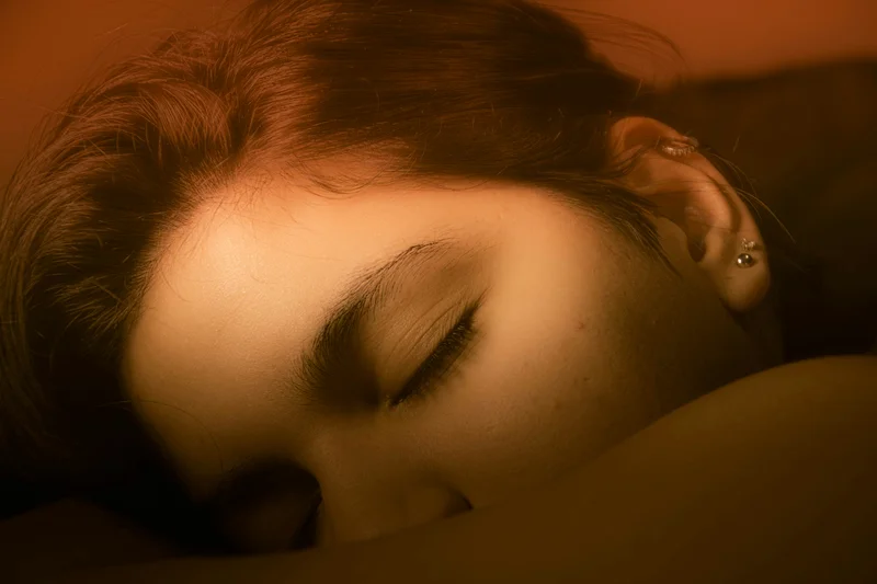 Woman sleeping peacefully for health and recovery