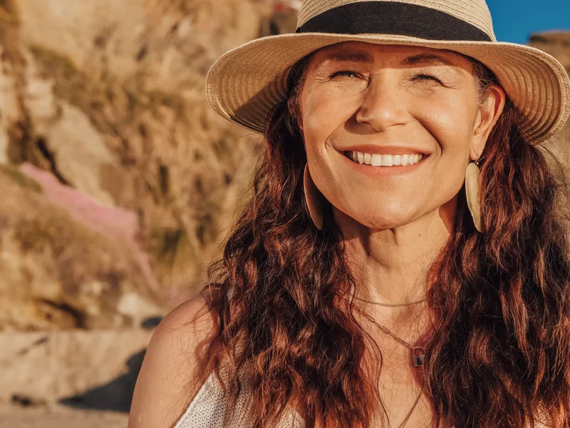 Confident woman in her 50s with healthy active outdoor lifestyle