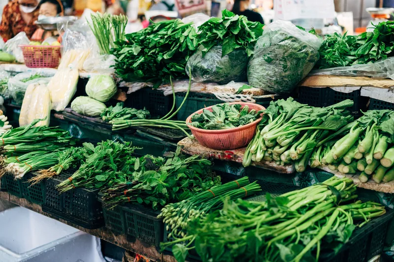 Folate-rich foods including dark leafy greens, legumes, and citrus fruits