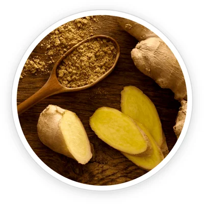 Ceylon ginger root and powder on a wooden surface
