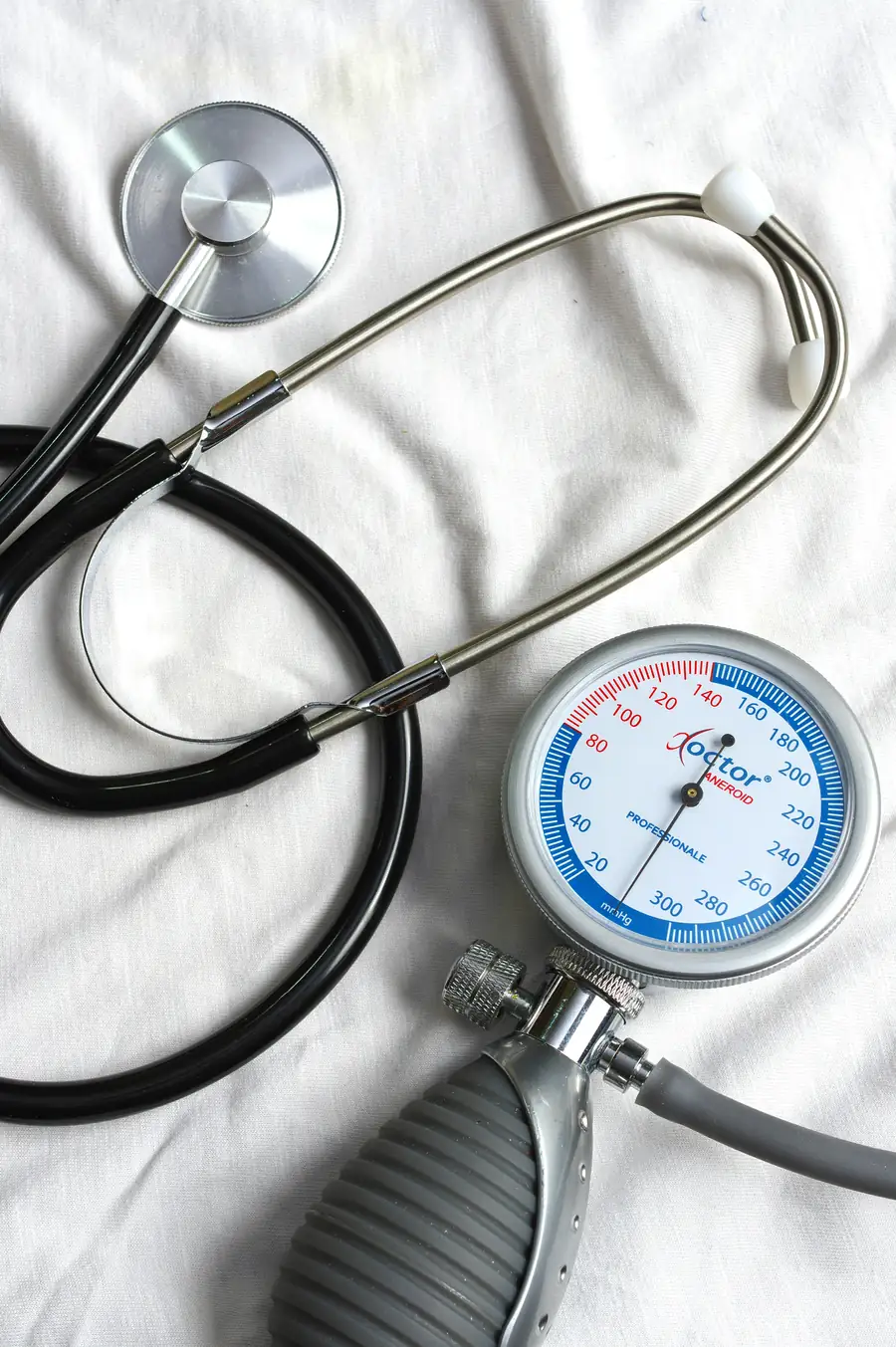 Blood pressure gauge and stethoscope representing ongoing medical monitoring during weight management treatment