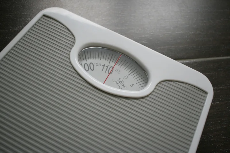 Scale representing the limitations of weight as the sole metric for health progress